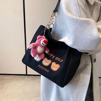Bolso de mano blanco y negro con banda ajustable de revestimiento de tela